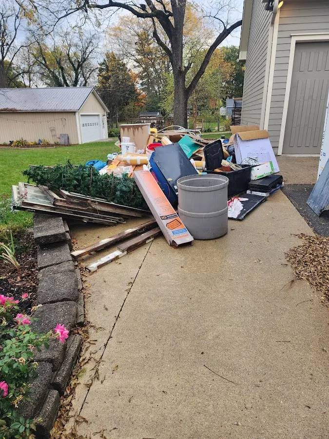 Dumpster being loaded with debris for 3 Yard Dumpster Rental in Westville